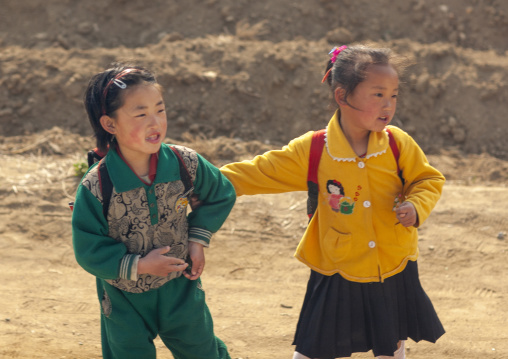 North Korean girls along the road in the countryside, South Pyongan, Nampo, North Korea