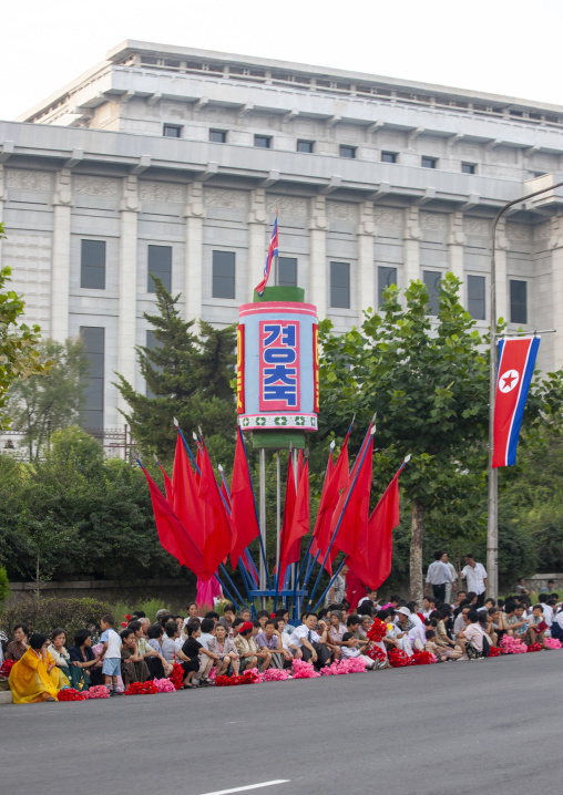 People celebrating the regim anniversary in the street, DGC, Pyongyang, North Korea