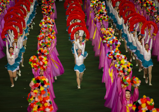 Women dancing in choson-ot during the Arirang mass games, DGC, Pyongyang, North Korea