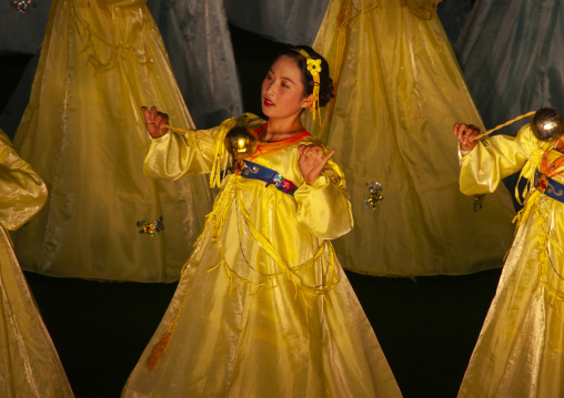 Women dancing in choson-ot during the Arirang mass games, DGC, Pyongyang, North Korea