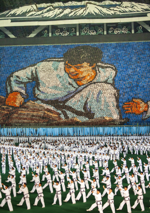 Children holding up boards during Arirang to create taekwando fighter, DGC, Pyongyang, North Korea