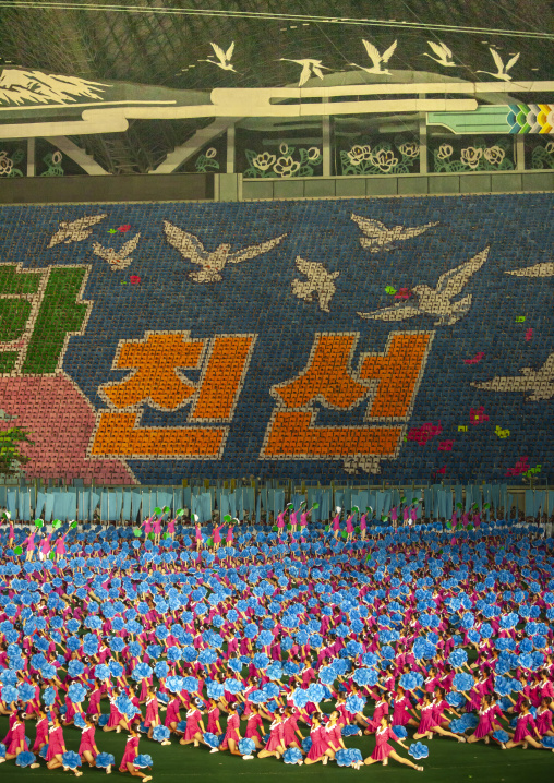 Children pixels holding up colored boards during Arirang mass games, DGC, Pyongyang, North Korea