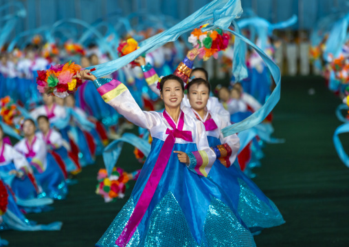 Women dancing in choson-ot during the Arirang mass games, DGC, Pyongyang, North Korea