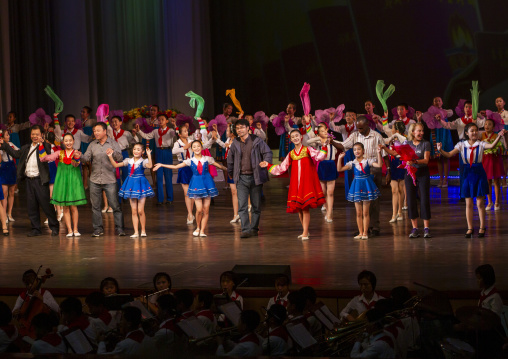 Young artists with tourists in Mangyongdae children's palace, DGC, Pyongyang, North Korea