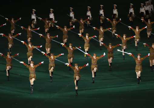 North Korean women dressed as soldiers dancing with swords in Arirang, DGC, Pyongyang, North Korea