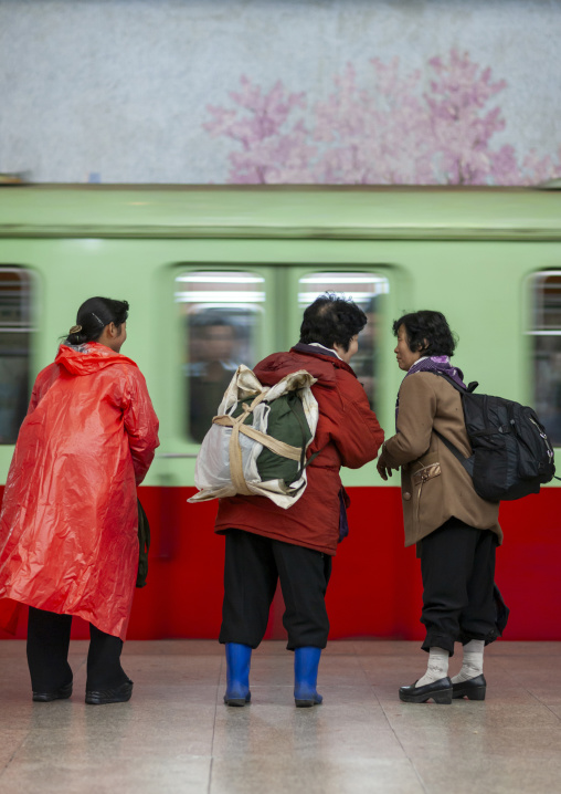 North Korean woman waiting in puhung metro station, DGC, Pyongyang, North Korea