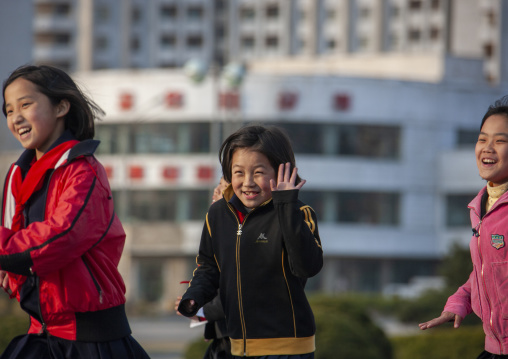 North Korean pioneer girls in the street, DGC, Pyongyang, North Korea