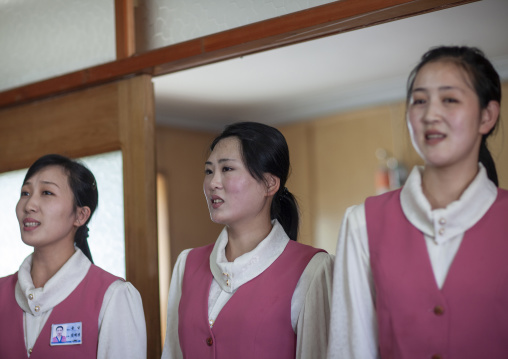 North Korean waitresses singing in a restaurant, DGC, Pyongyang, North Korea