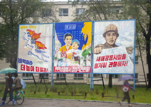 Propaganda billboards in the street, South Hamgyong, Hamhung, North Korea