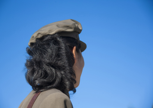 North Korean guide in the Grand monument of lake Samji, Ryanggang, Samjiyon, North Korea