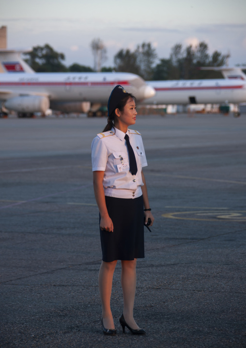 North Korean airport employee on the tarmac, DGC, Pyongyang, North Korea