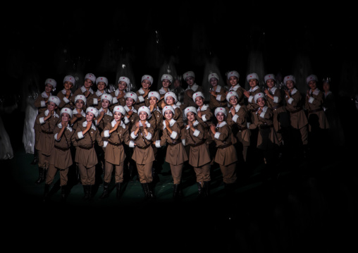 Women dressed as soldiers during the Arirang mass games at may day stadium, DGC, Pyongyang, North Korea