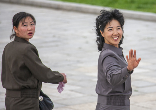 Smiling North Korean women in the street looking at camera, DGC, Pyongyang, North Korea