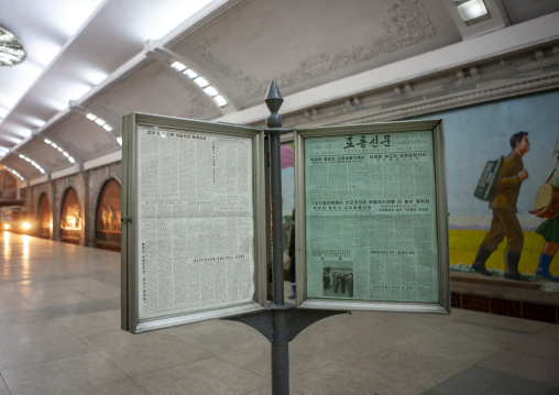 Offical state newspaper in a subway station, DGC, Pyongyang, North Korea