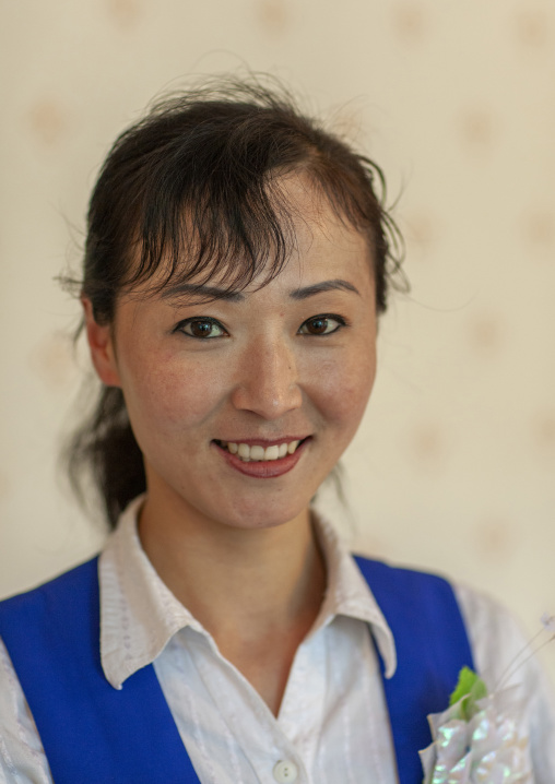 Portrait of a smiling North Korean woman, North Hwanghae, Kaesong, North Korea