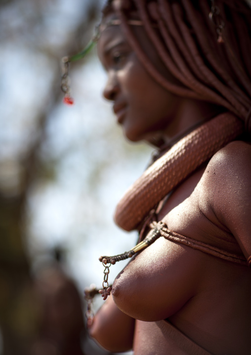 Himba Woman Called Mucaniama Wearing A  Plastic Jewel, Village Of Hoba Haru, Angola