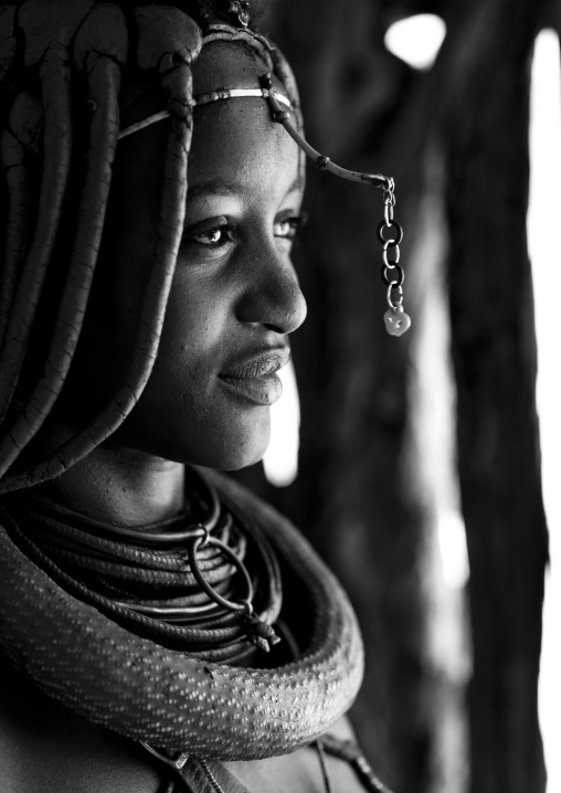 Himba Woman Called Mucaniama Wearing A  Plastic Jewel, Village Of Hoba Haru, Angola