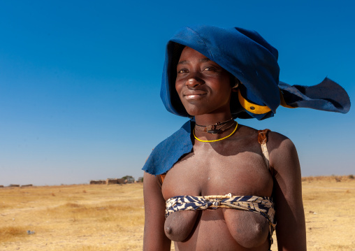 Mucubal tribe woman wearing a blue headwear, Namibe Province, Virei, Angola