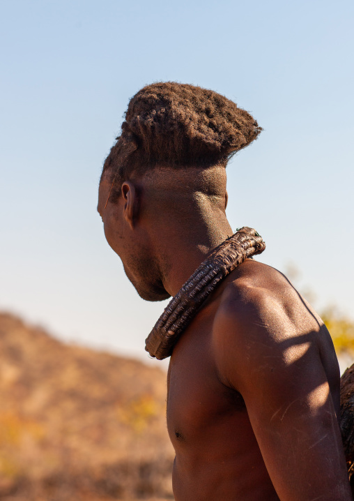 Himba tribe man with the traditional necklace, Cunene Province, Oncocua, Angola