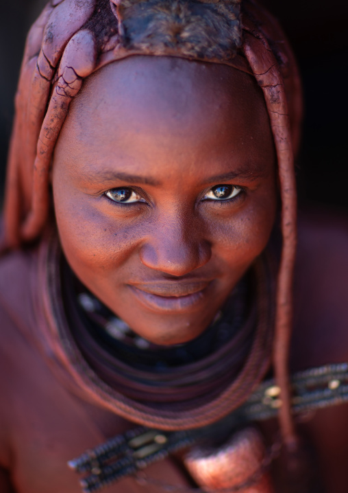 Portrait of a Himba tribe woman covered with otjize, Cunene Province, Oncocua, Angola