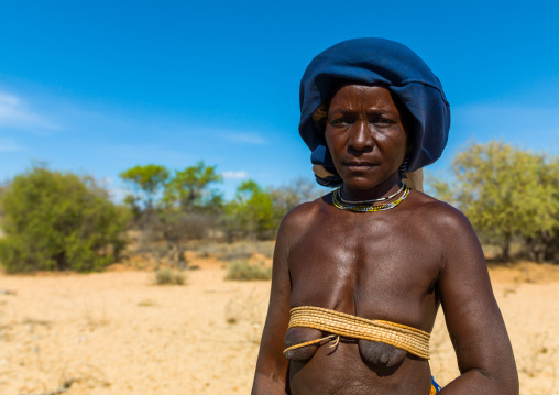 Mucubal tribe woman wearing a blue headwear, Namibe Province, Virei, Angola