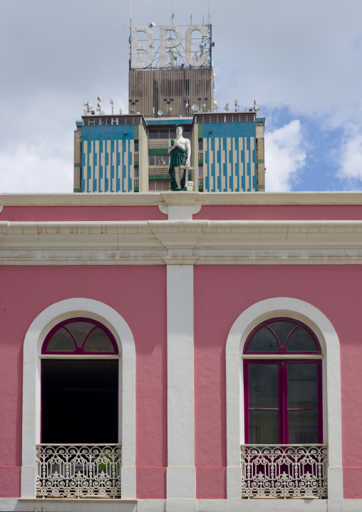 Portuguese Colonial House In Front Of A Building Of The Seventies, Luanda, Angola