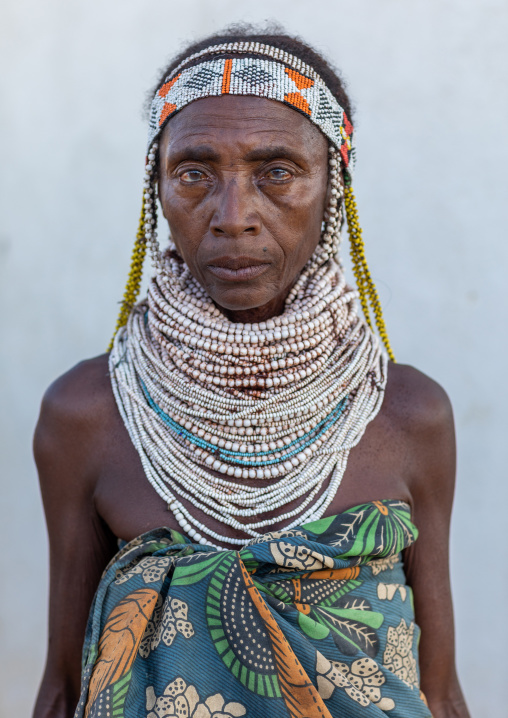 Handa tribe woman with huge beaded necklaces, Huila Province, Hoque, Angola