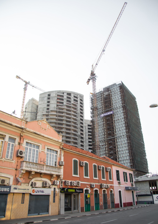 Old portuguese colonial building in front of a new skyscraper, Luanda Province, Luanda, Angola