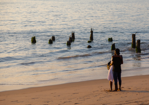 Angolan couple on the beach, Benguela Province, Benguela, Angola