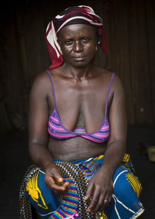 Benin, West Africa, Onigbolo Isaba, holi tribe woman covered with traditional tattoos and scars