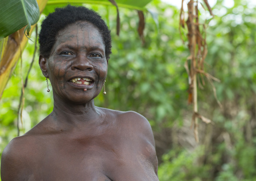 Benin, West Africa, Onigbolo Isaba, holi tribe woman covered with traditional tattoos and scars