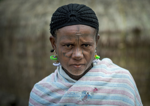 Benin, West Africa, Gossoue, a tattooed fulani peul tribe woman portrait