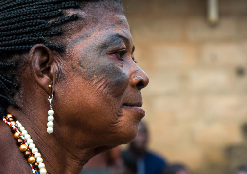 Benin, West Africa, Bopa, voodoo priestess with tattooed face during a ceremony