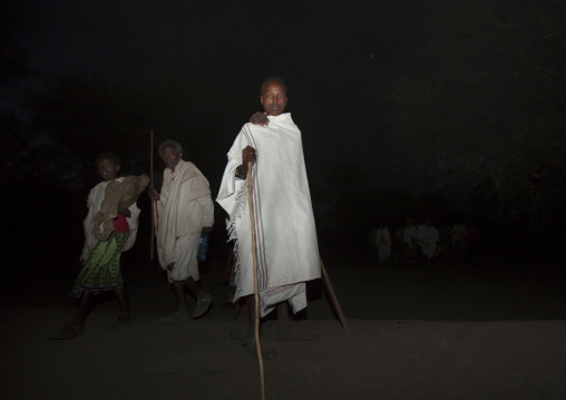 Night Shot Of Karrayyu Tribe People In Traditional Clothes During Gadaaa Ceremony, Metahara, Ethiopia