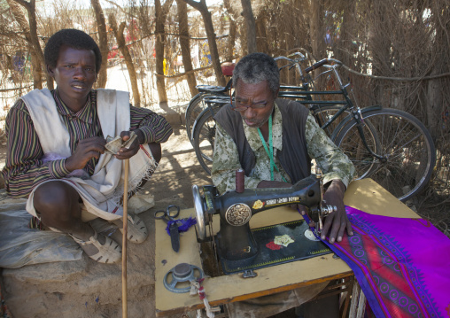 Karrayyu Tribe Man With A Taylor In The Market Of Metehara, Ethiopia