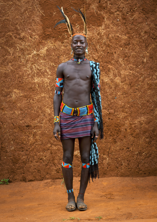 Smiling Banna Tribe Whipper Man In Traditional Clothing Ethiopia