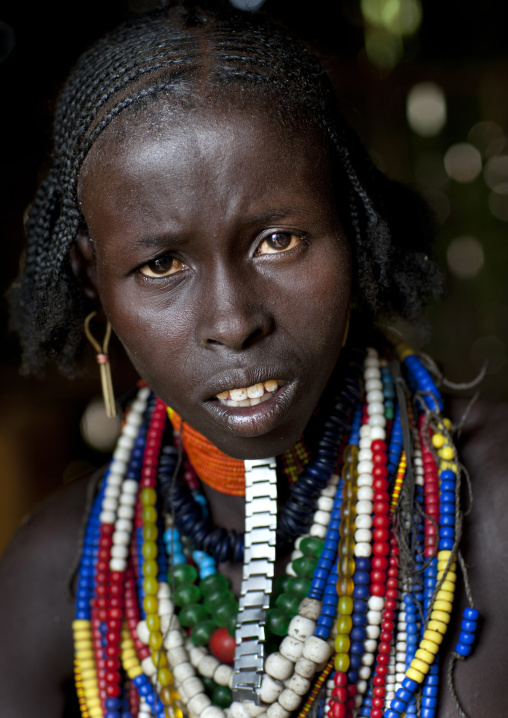 Portrait Of Beautiful Erbore Tribe Woman Wearing Beaded Necklace,  Omo Valley, Ethiopia