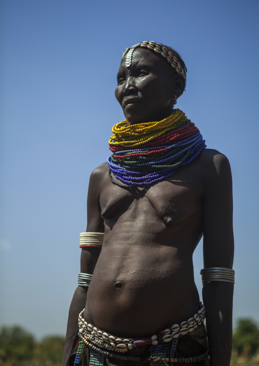 Portrait Of A Nyangatom Tribe Woman With Huge And Colourful Necklaces, Omo Valley, Kangate, Ethiopia