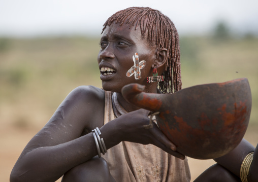 Bashada Tribe Woman Drinkinf Alcohol During A Bull Jumping Ceremony, Dimeka, Omo Valley, Ethiopia