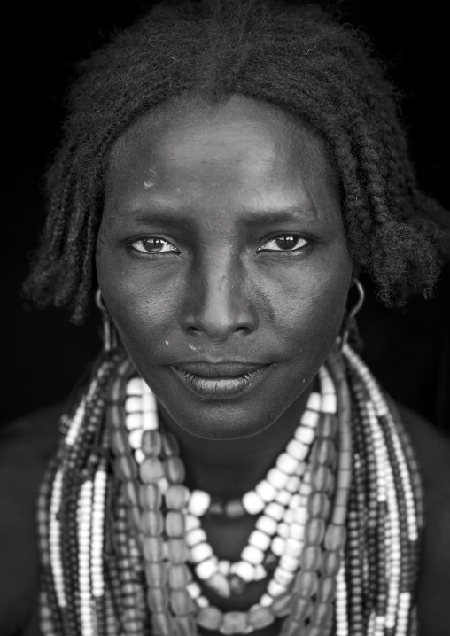 Portrait Of Beautiful Erbore Tribe Woman Wearing Beaded Necklace,  Omo Valley, Ethiopia