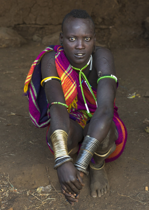 Portrait Of A Bodi Tribe Woman With Copper Bracelets, Hana Mursi, Omo Valley, Ethiopia