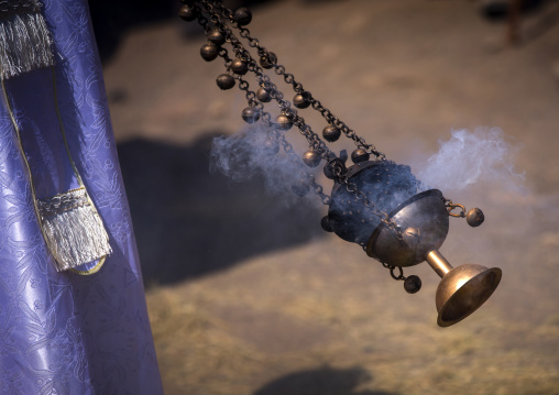 Ethiopian Orthodox Priest Spreading Insence With A Censer During Timkat Epiphany Festival, Lalibela, Ethiopia