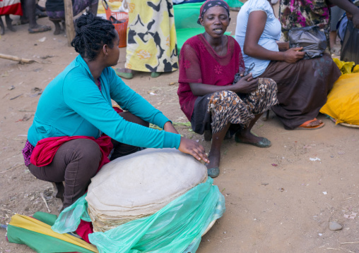 Women Selling Injera In Jinka Market, Omo Valley, Ethiopia