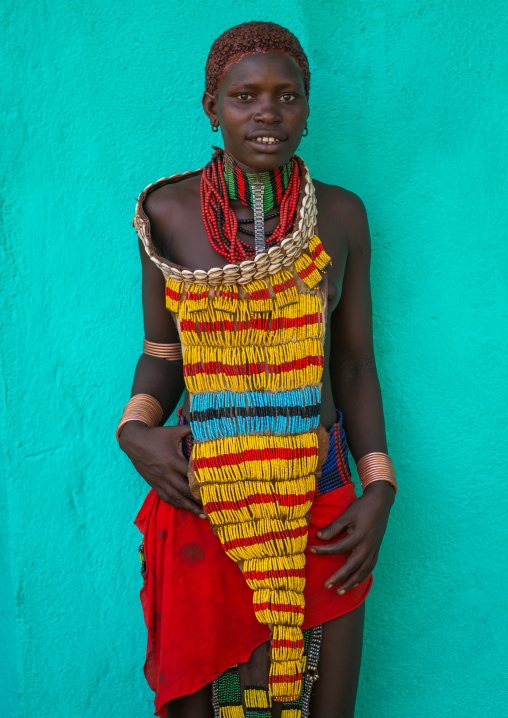 Hamer tribe teenage girl in traditional clothing, Omo valley, Turmi, Ethiopia