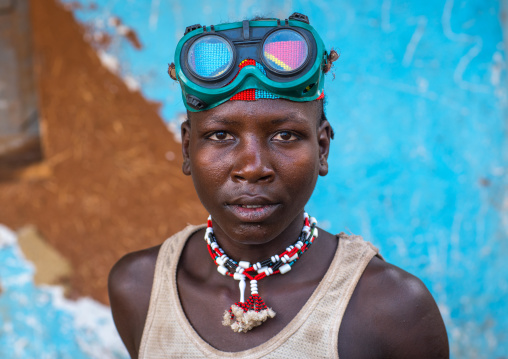 Bana tribe man with welding googles used as a fashion item, Omo valley, Key afer, Ethiopia