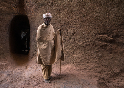 Lonely ethiopian monk during kidane mehret orthodox celebration, Amhara region, Lalibela, Ethiopia