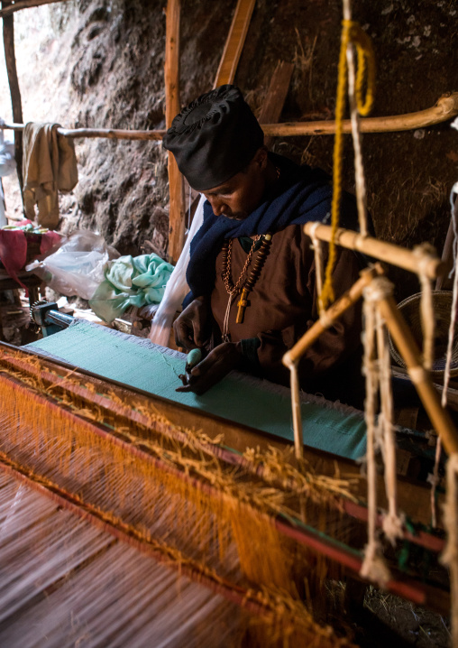 Orthodox monk weaver working, Amhara region, Lalibela, Ethiopia