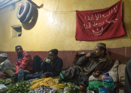 Ethiopian people chewing khat during a sufi ceremony lead by Amir Redwan in Ummi Tahir Nabigar, Harari Region, Harar, Ethiopia