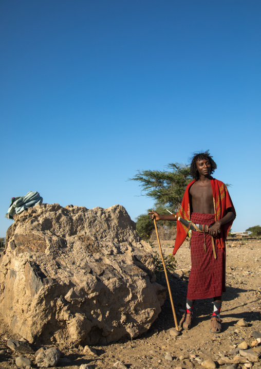 Portrait of an Afar tribe man with his guile knife, Afar region, Chifra, Ethiopia