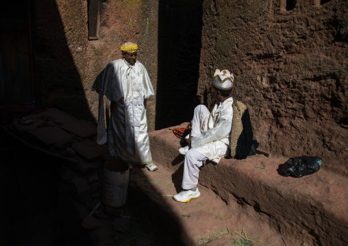 Orthodox ethiopian priests in a rock church, Amhara region, Lalibela, Ethiopia